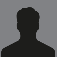 Placeholder avatar icon: a simple, dark silhouette of a head and shoulders against a solid gray background.