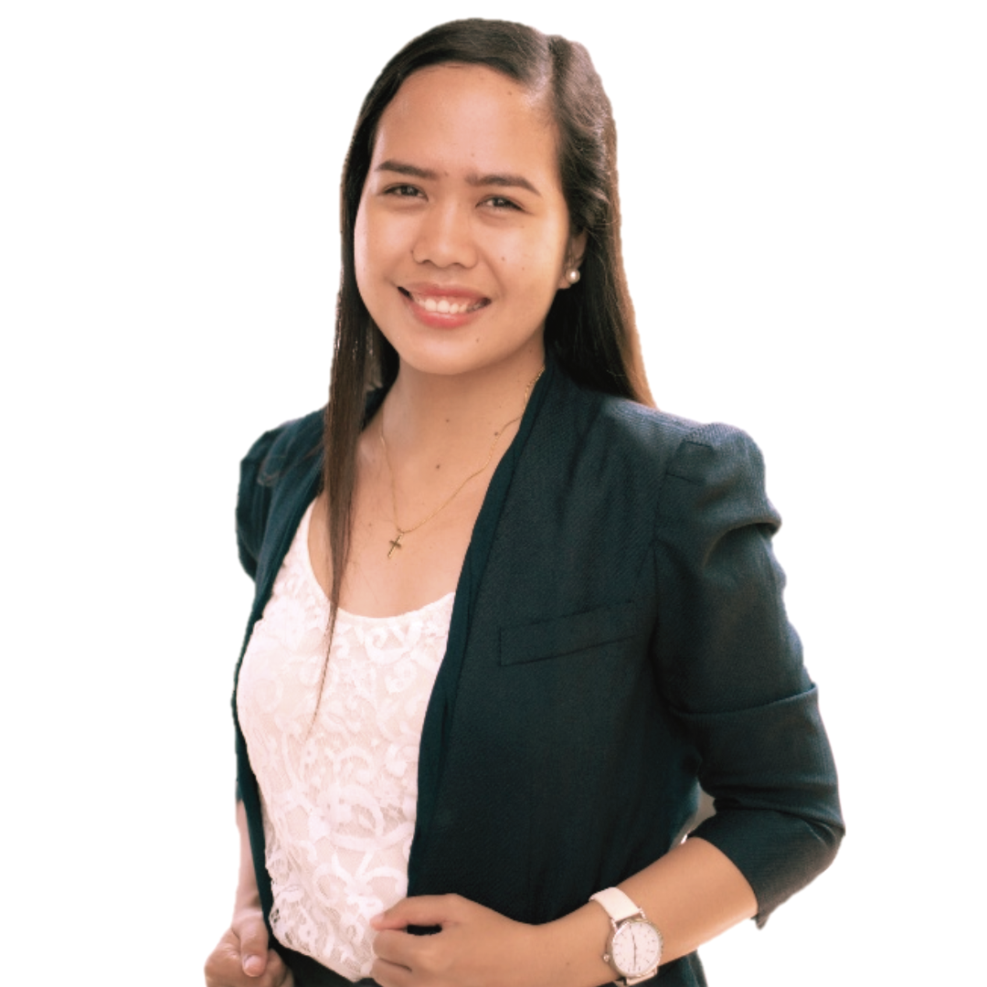 A smiling professional wearing a white lace top under a dark green blazer with a white watch on her left wrist.