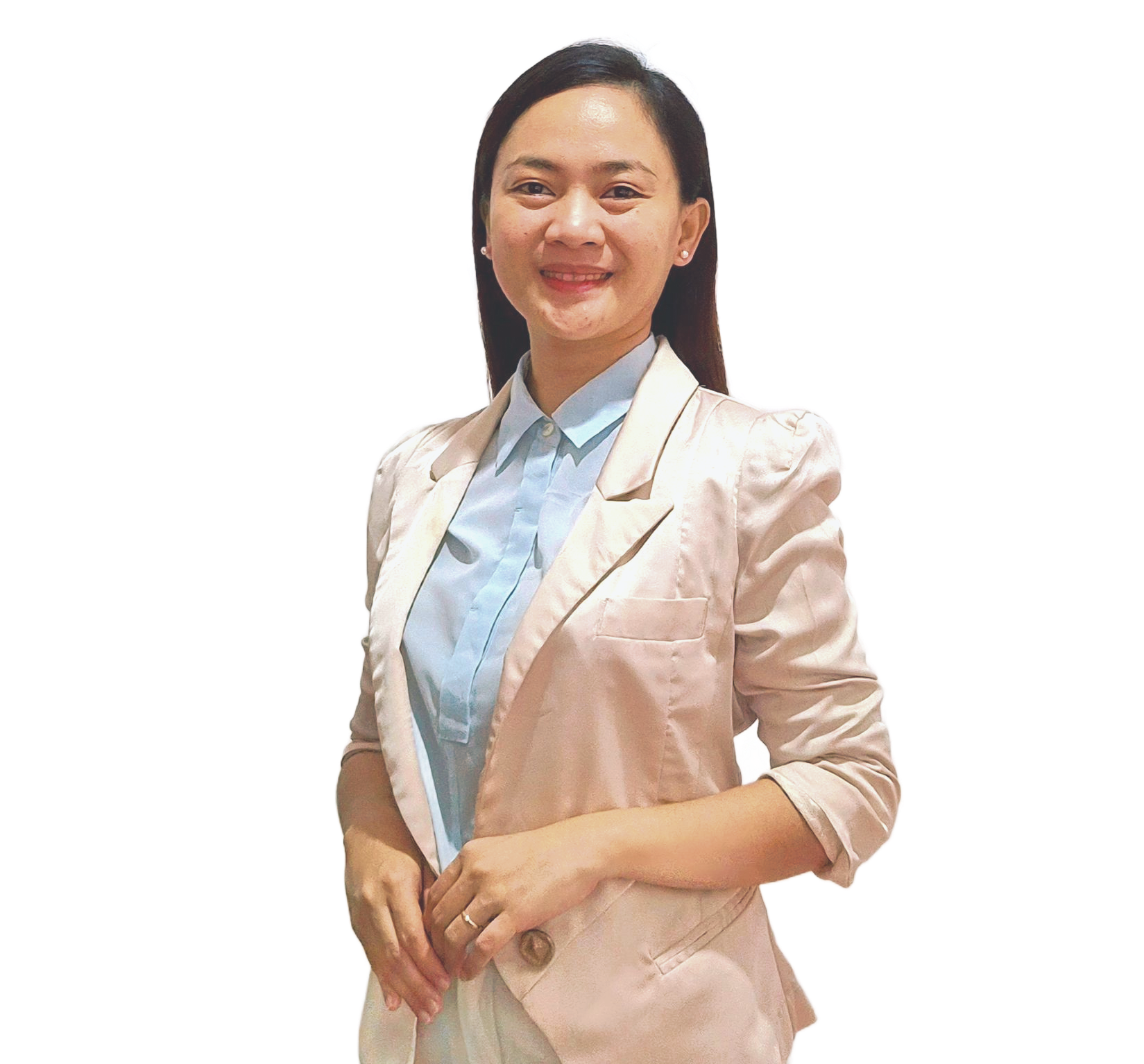 A smiling person wearing a light blue button-up shirt and a beige blazer against a plain white background.