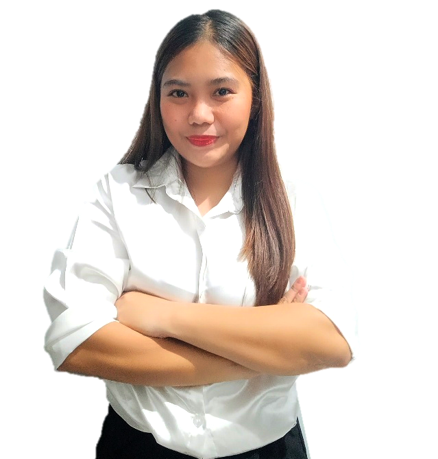 A person with long brown hair, wearing a white button-down shirt, stands with arms crossed against a plain white background.