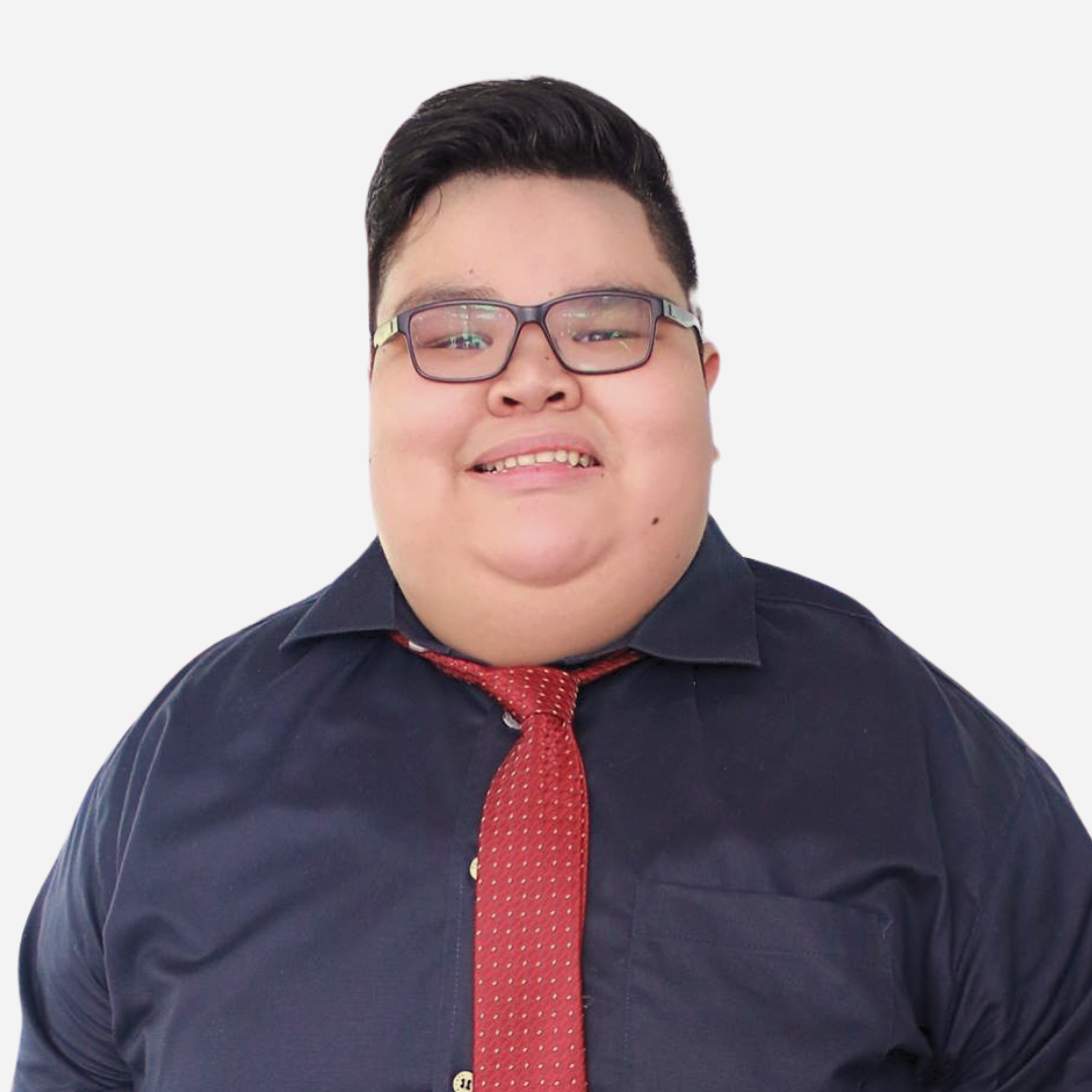 Marvin Lester Negosa, the Senior Marketing Associate, wearing glasses and a tie, is smiling for the camera