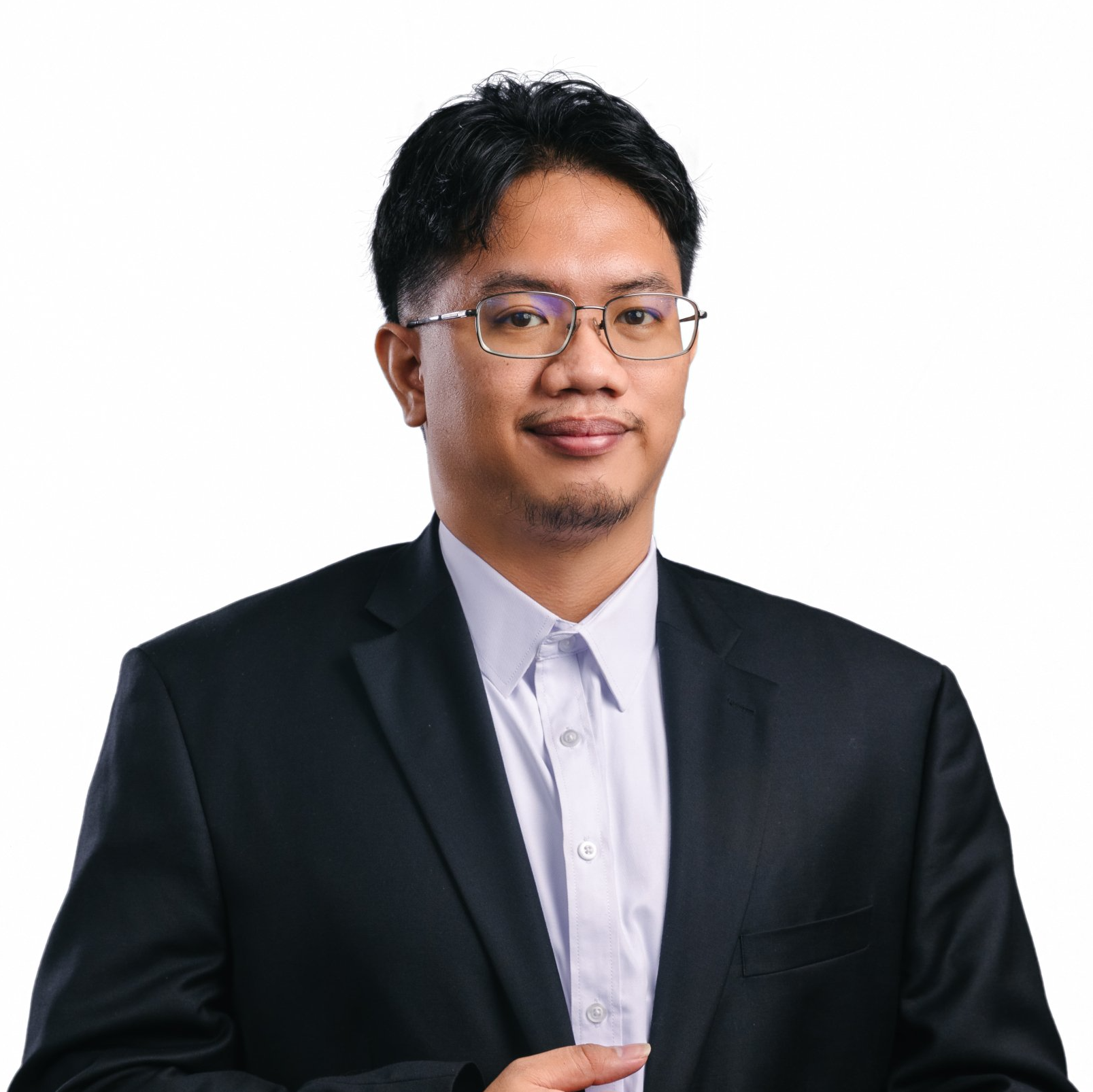 Vladimir Daloos, the Associate Director for IT, in a suit and glasses, is standing in front of a white background.