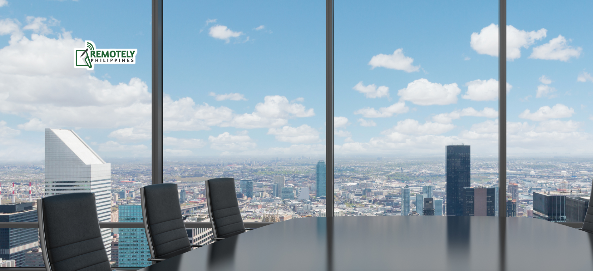Office conference room with chairs overlooking a bright city skyline through large windows