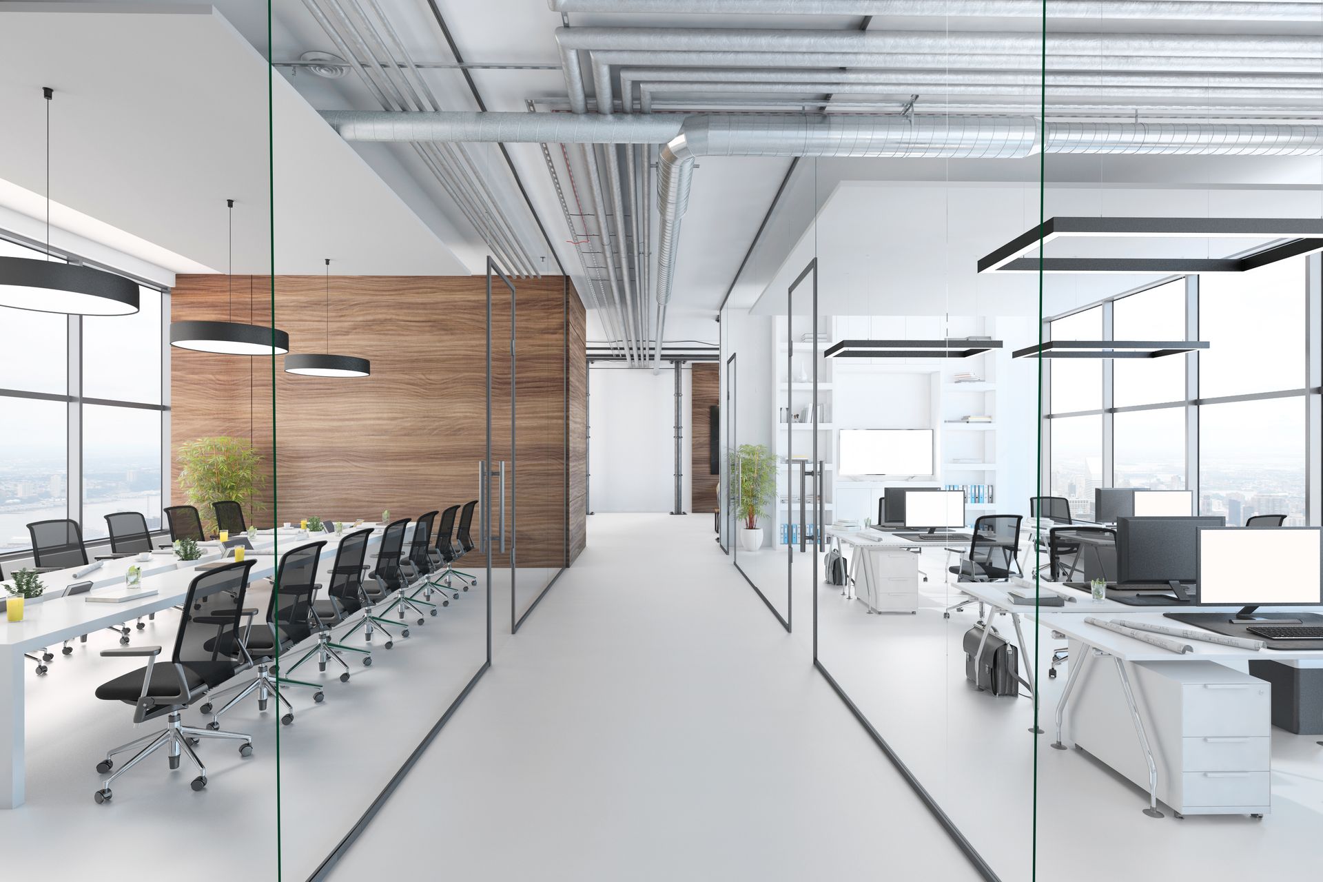 Ufficio moderno open space con pareti divisorie in vetro, scrivanie bianche e sedie nere.