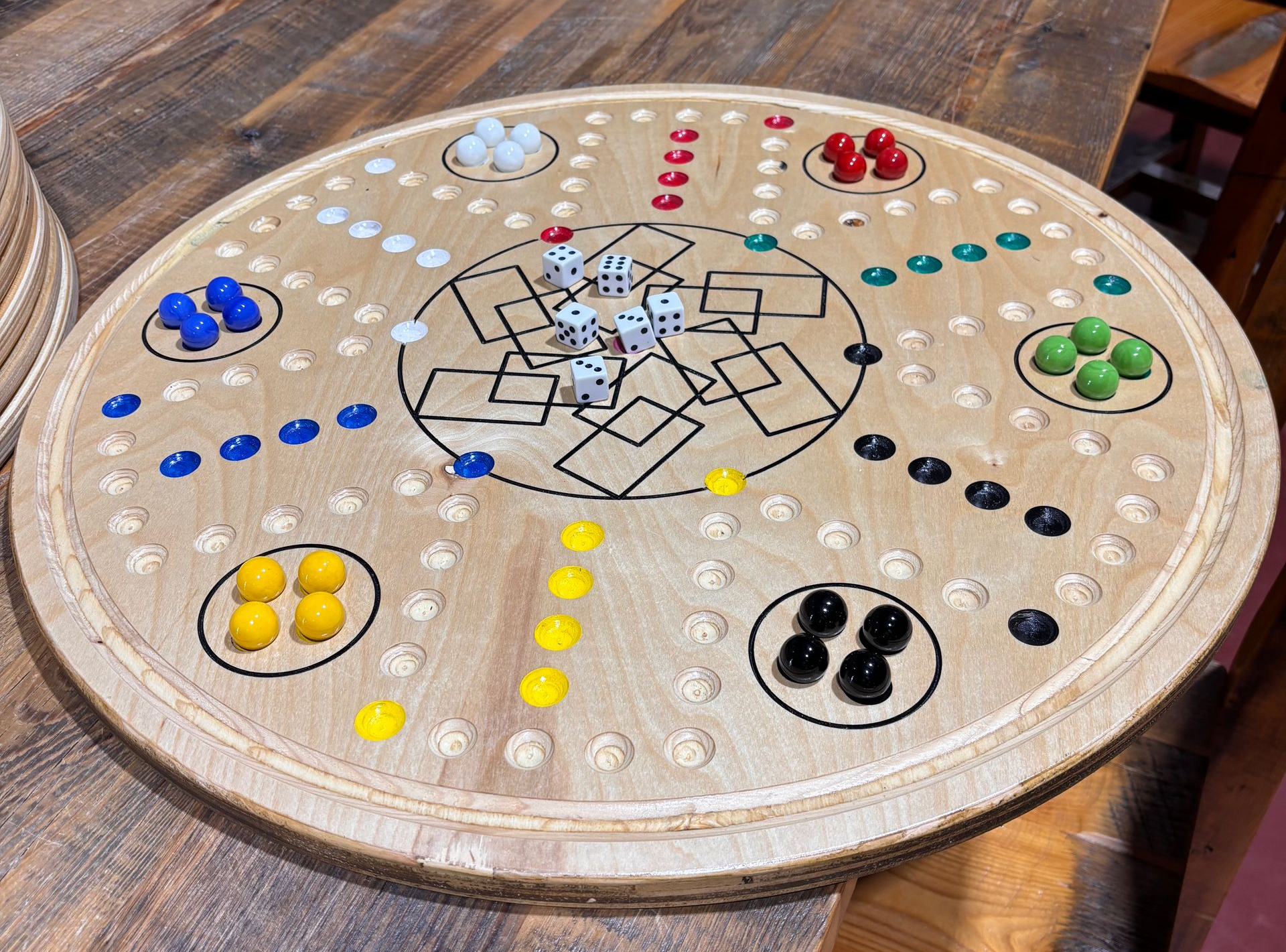 Wahoo Board. Fun board game for all ages. Using 3/4 inch marble set with 6 different colors and one die provided. Play singles or as teams. Let's the games begin! Online Store with shipping or pickup in Hutchinson, KS