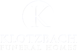 Klotzback funeral home logo in white text