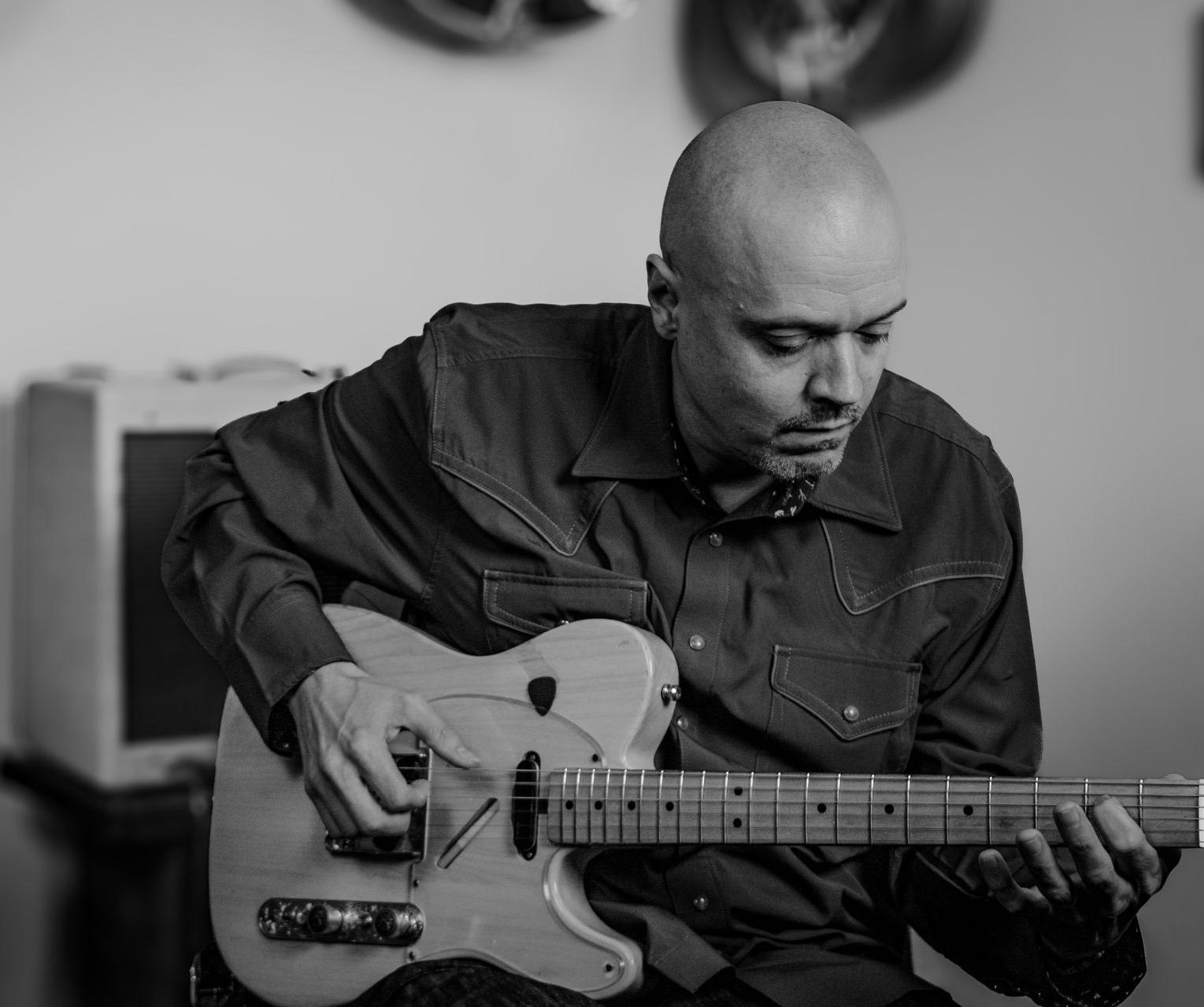 David Dunavant teaching electric guitar during a private guitar lesson in Little Rock, Arkansas