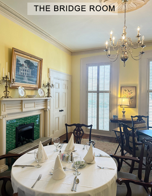 A room with a table and chairs called the bridge room
