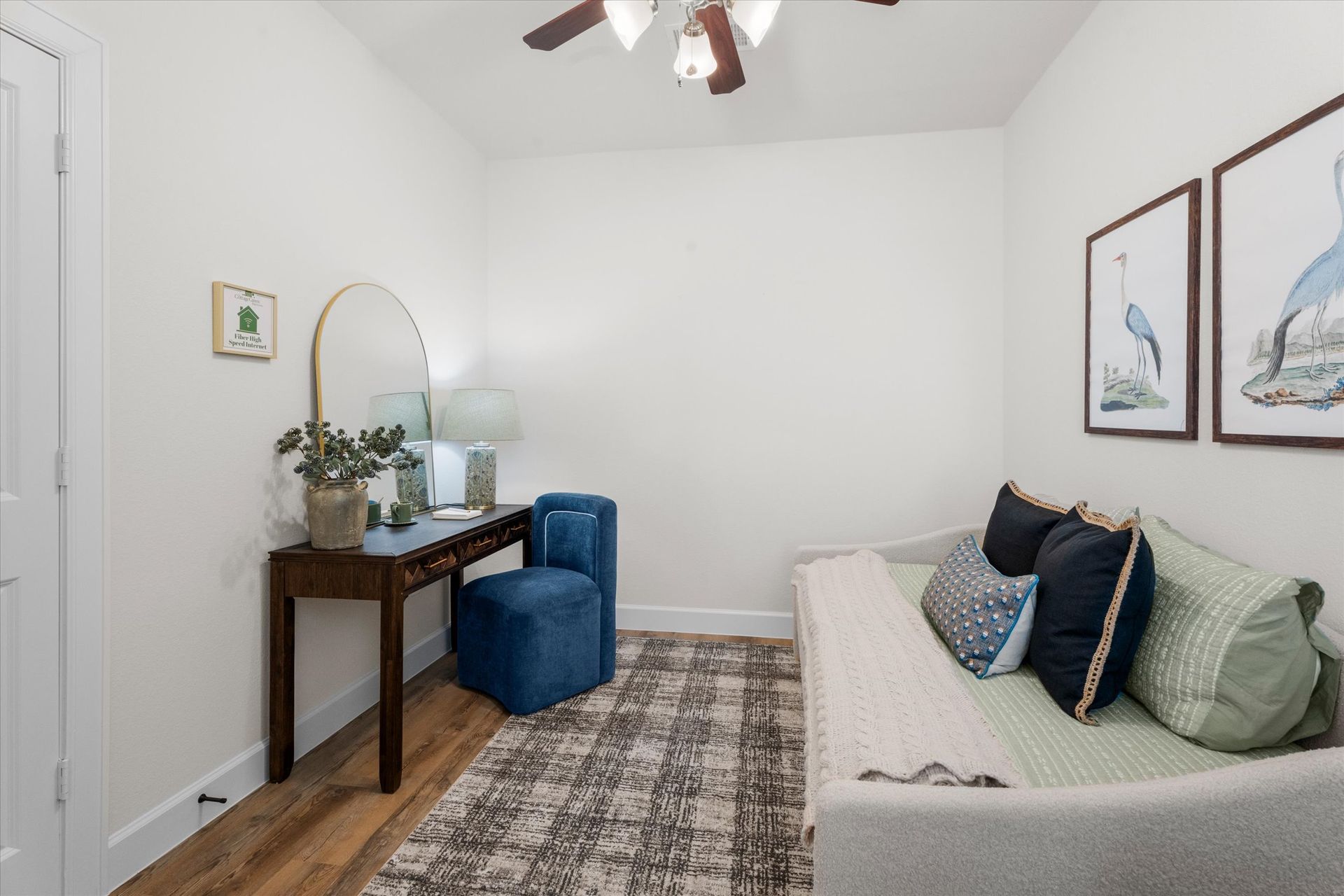 Flexible bonus room with seating and workspace at Cottage Green Simpsonville