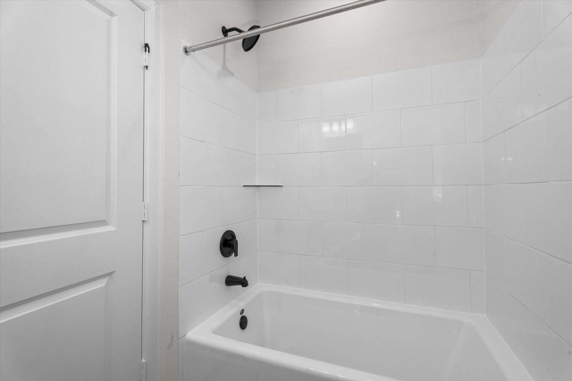 Apartment bathroom with shower and tub combination at Cottage Green Simpsonville