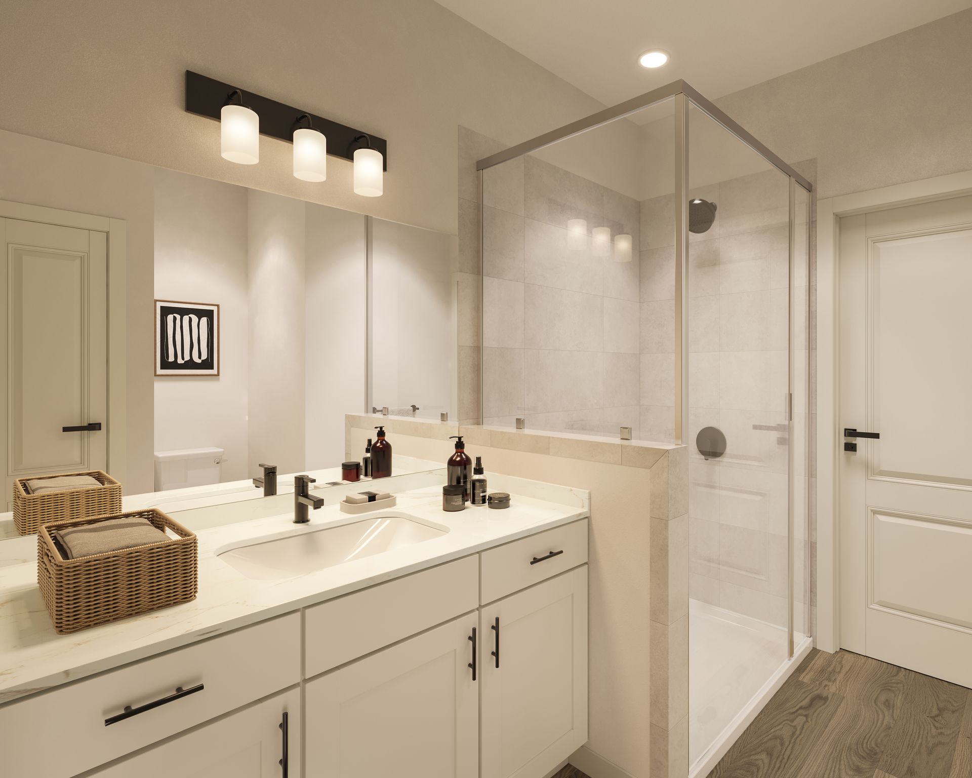 Modern bathroom with double vanity, large mirror, glass shower, and white finishes