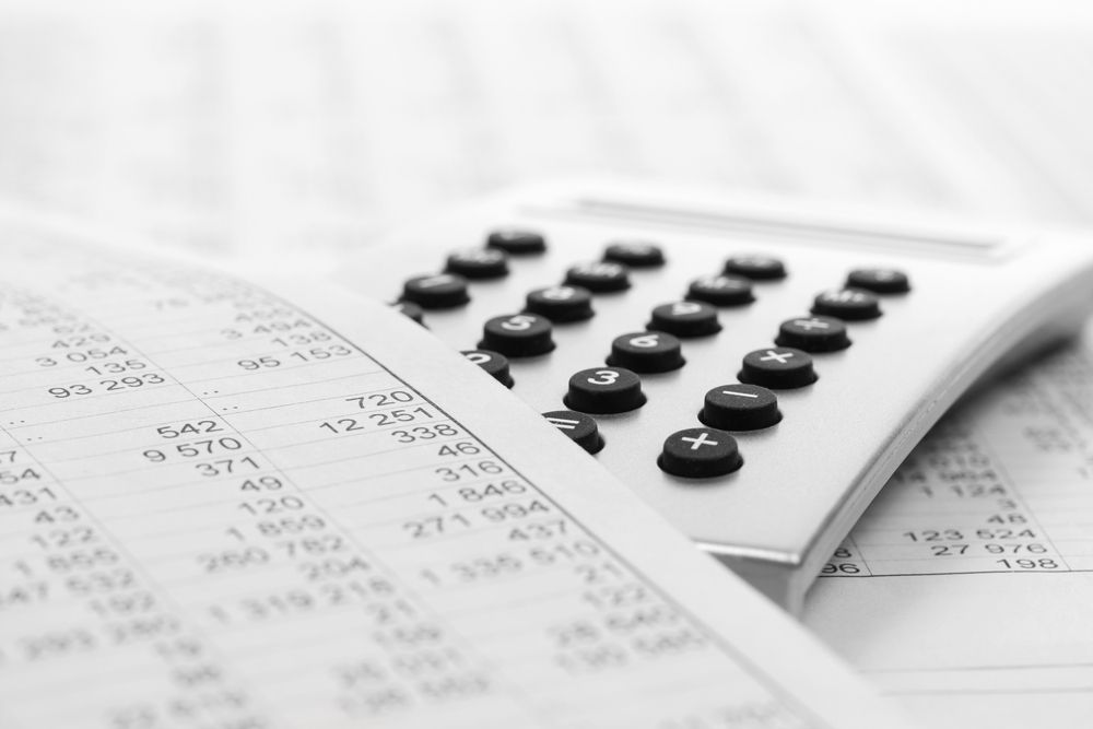 A Calculator Is Sitting On Top Of A Piece Of Paper — Simple Solutions Accounting In Bundaberg West, QLD