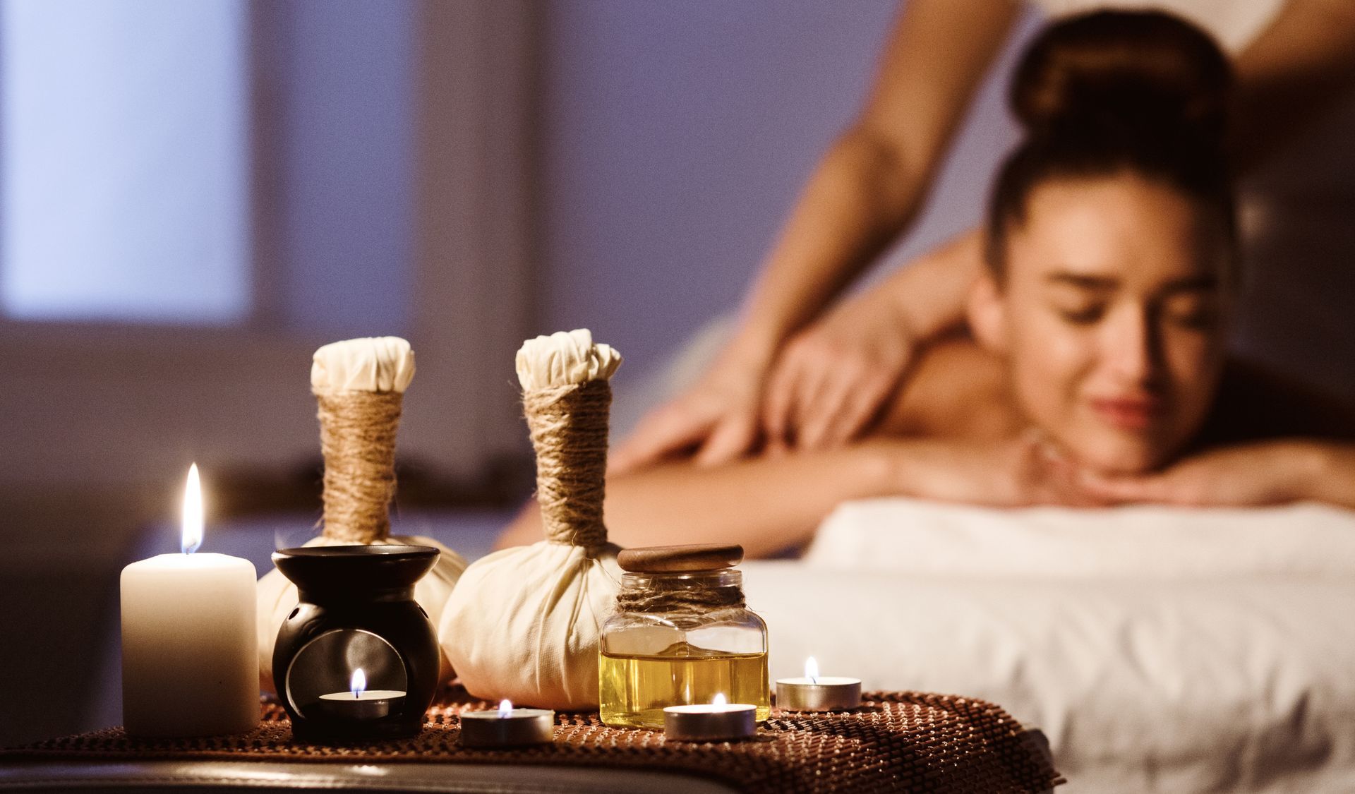 A woman is getting a massage in a spa.