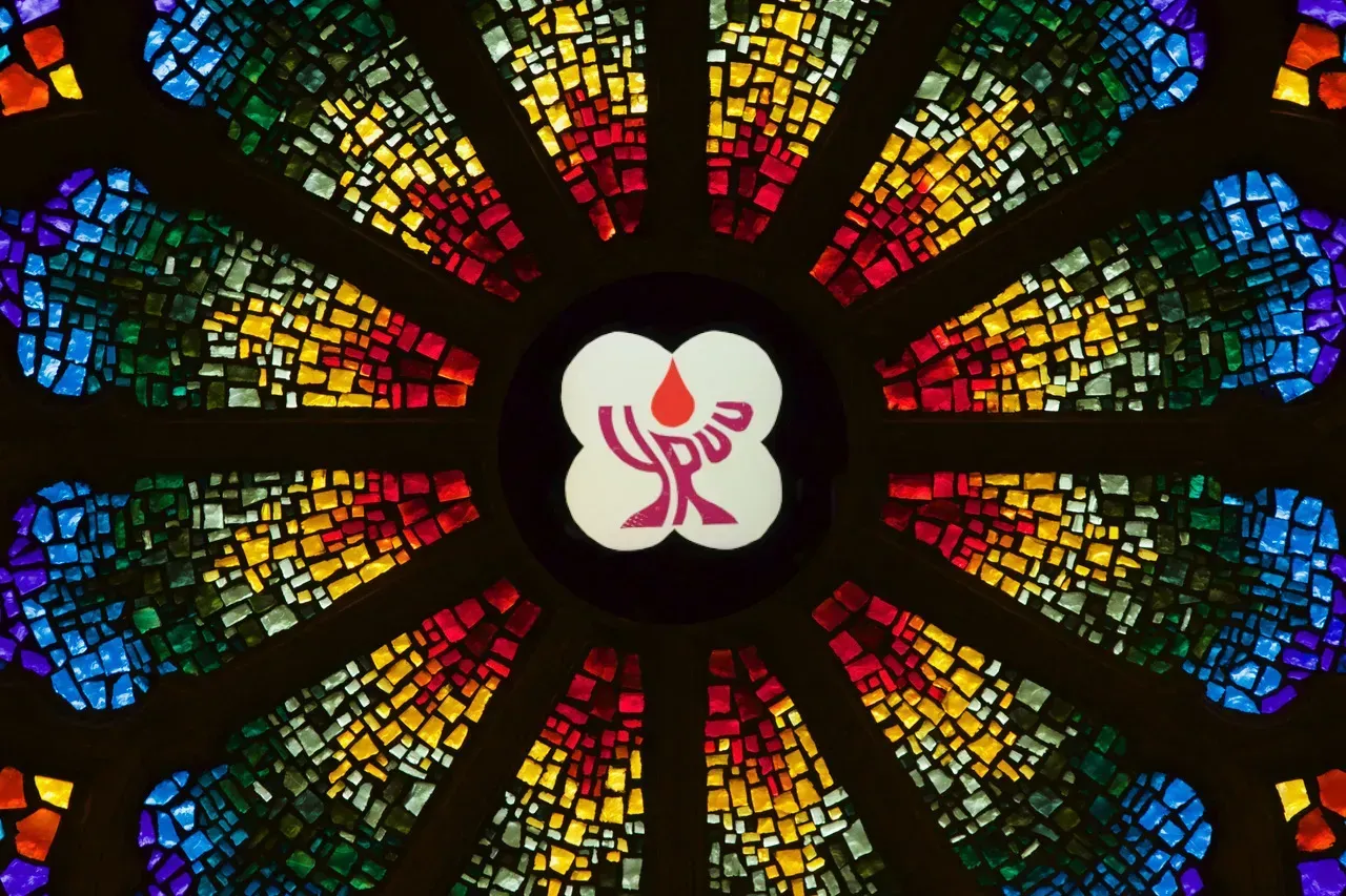 Roe Window with a guitar in the center.