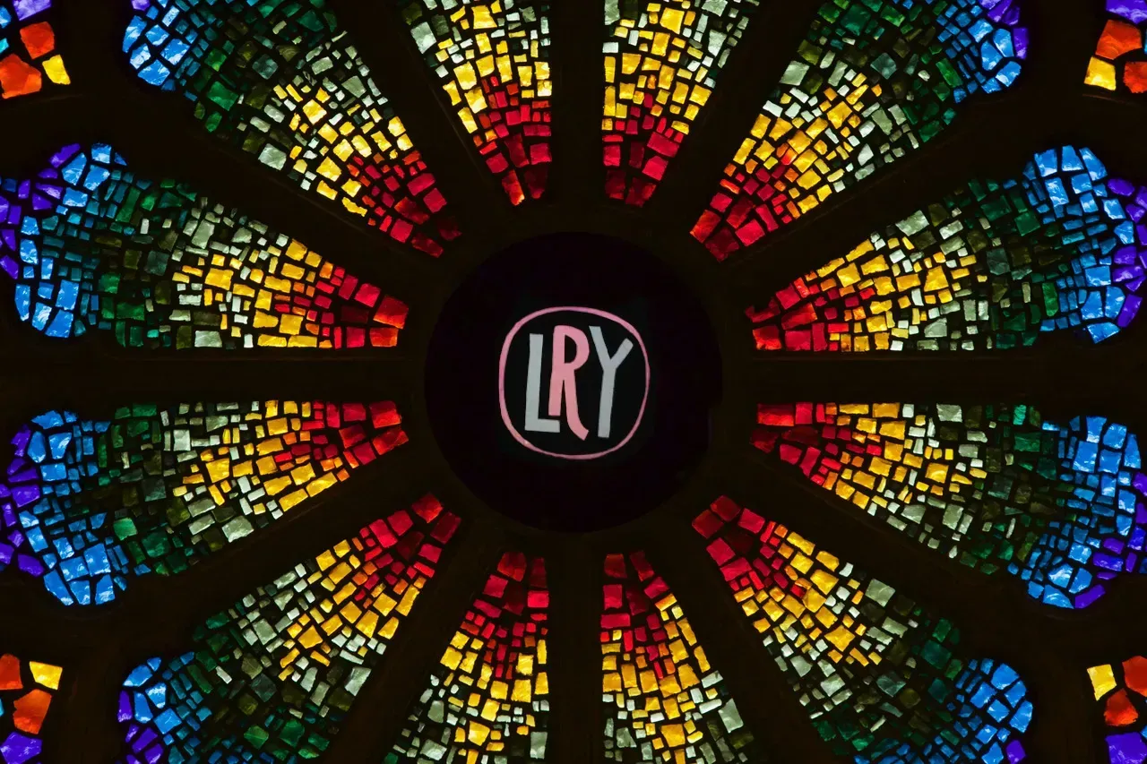 Rose Window with the letters LRY in the center.