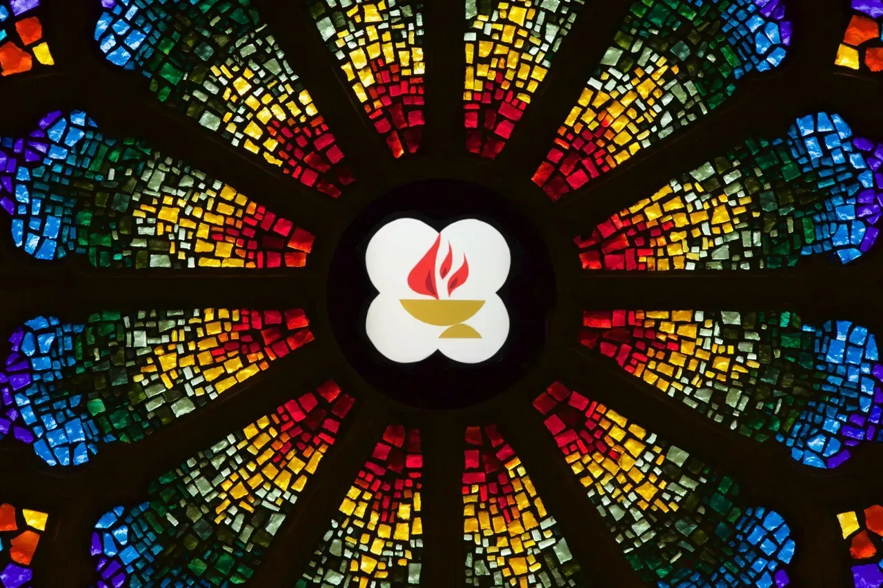 Rose Window with Stylized Chalice in the center.