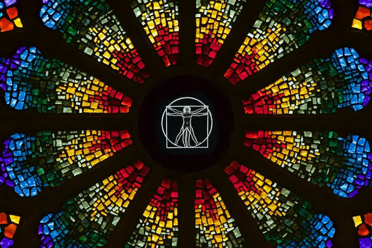 Rose window with the Vitruvian Man man in the center.