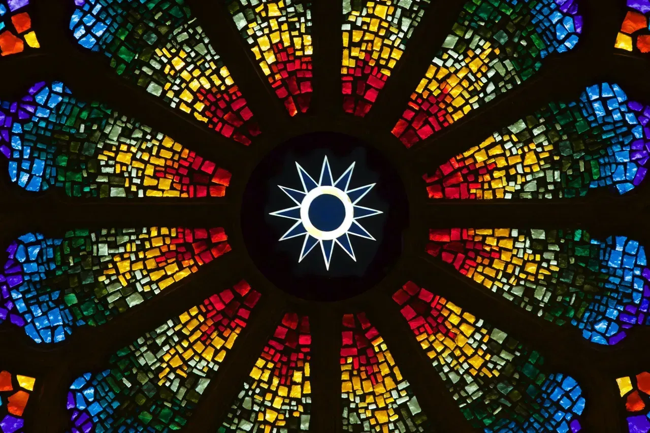 Rose Window with a symbol for the Great Spirit in the center.