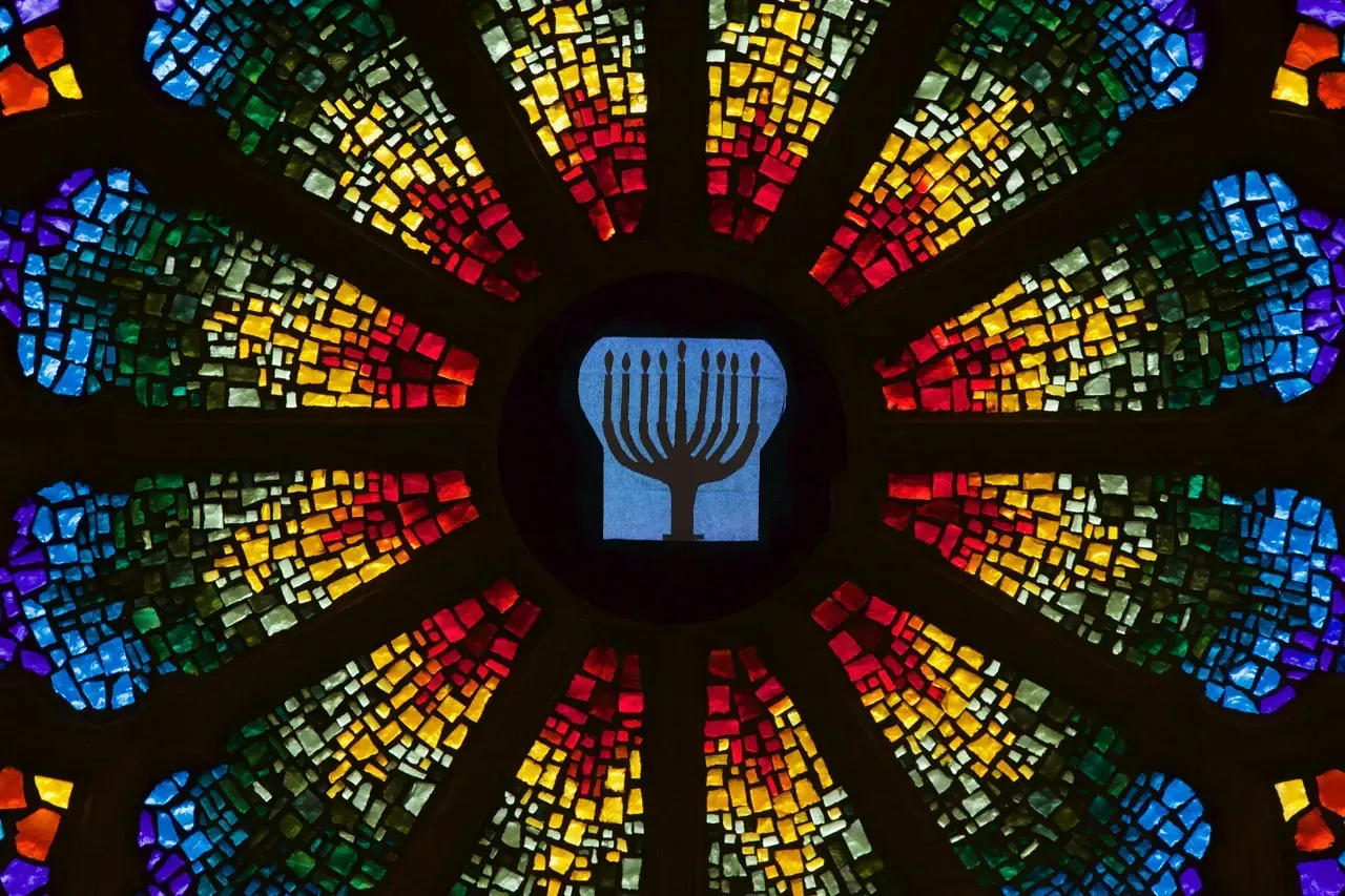 Rose Window with a menorah in the center.