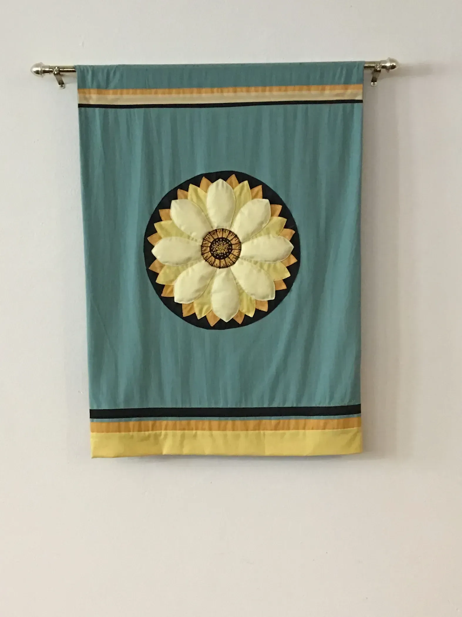 Blue banner with yellow lotus in the middle