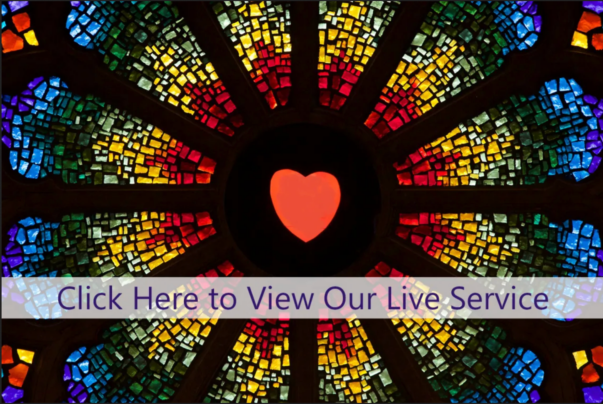 Rose Window with a heart in the center.
