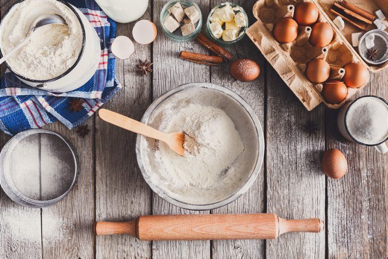 baking ingredients at the top of wooden table