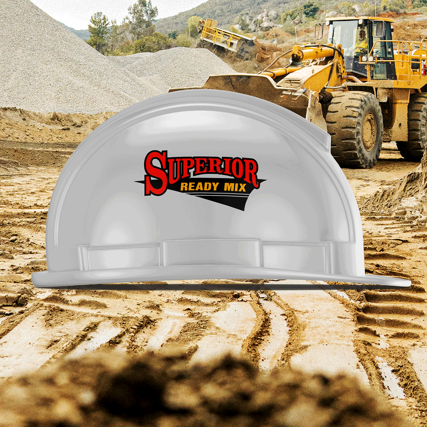 A white hard hat with superior ready mix written on it