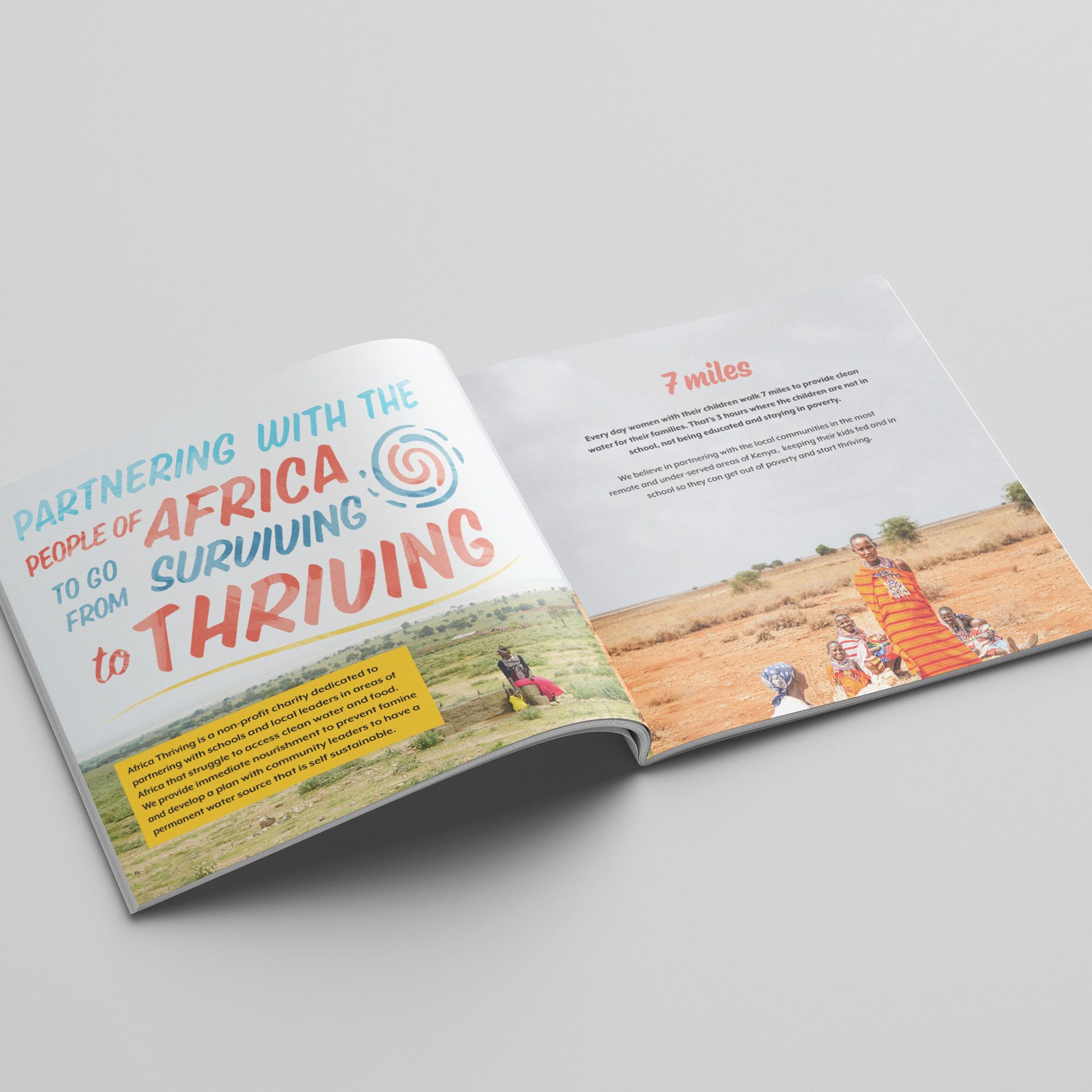 A book is open to a page that says `` partnering with the people of africa to go from surviving to thriving ''.