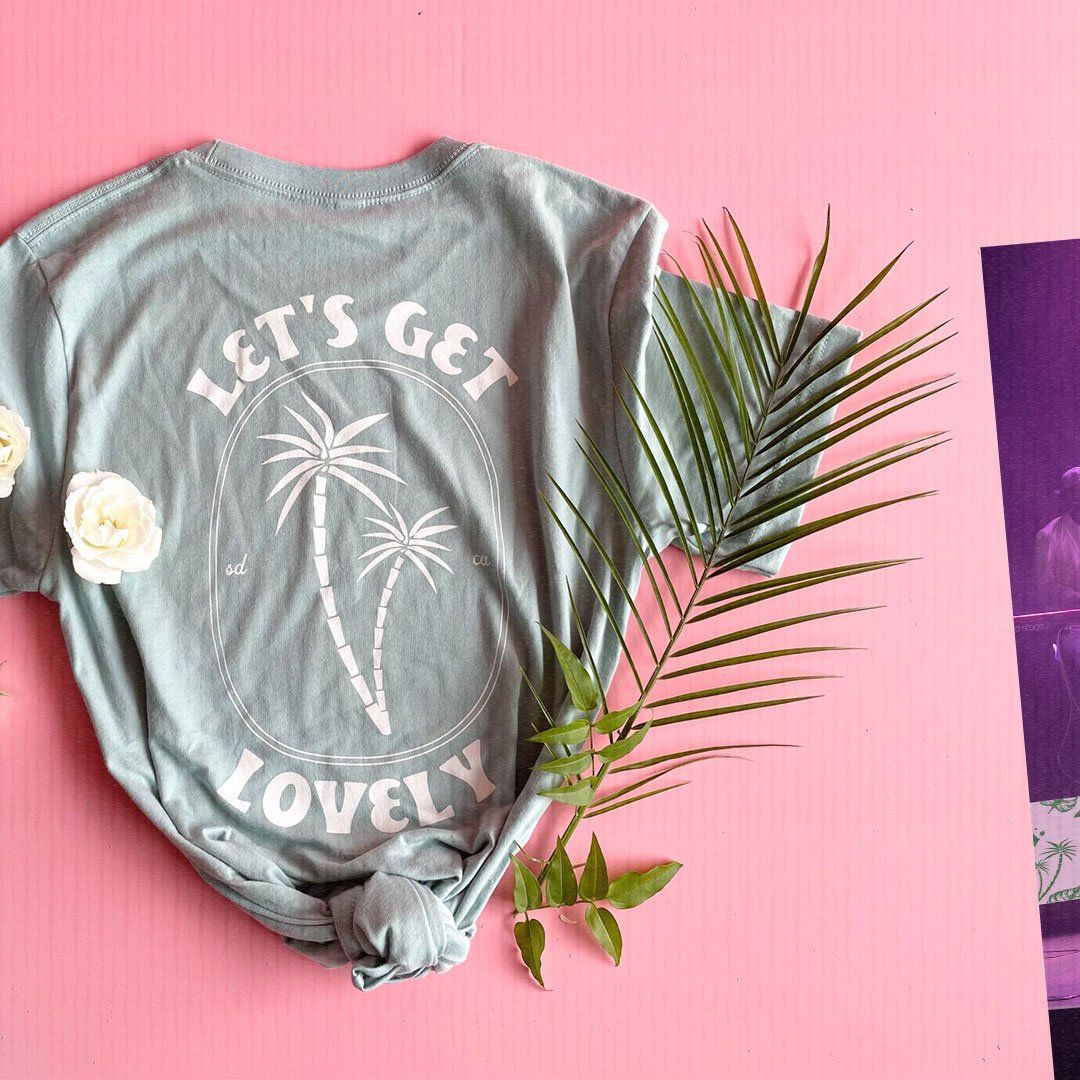 A t-shirt that says let 's get lovely on it