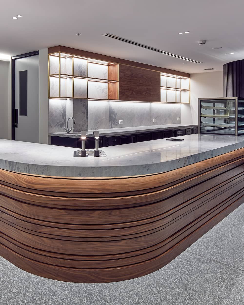 A Large Empty Office With Lots of Desks and Chairs — Concept Kitchens In Port Macquarie, NSW