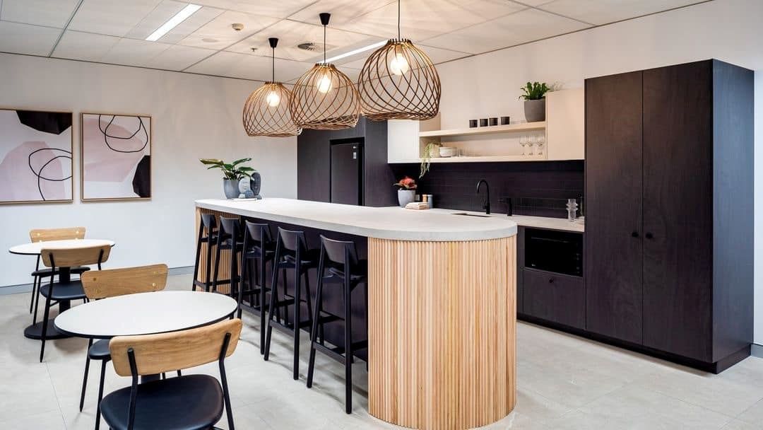 A Kitchen With a Long Island , Tables and Chairs — Concept Kitchens In Port Macquarie, NSW