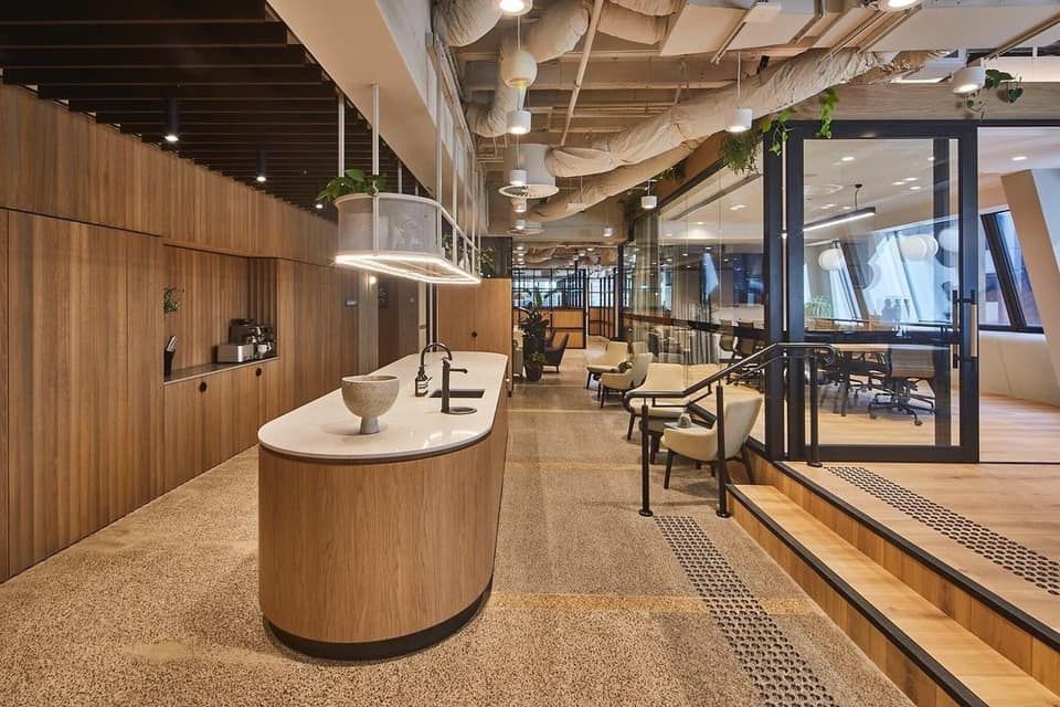 A Large Room With a Counter in the Middle of It — Concept Kitchens In Port Macquarie, NSW