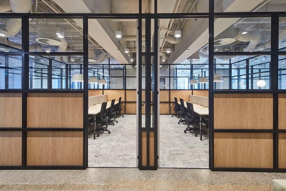 A large office with a lot of windows and cubicles. — Concept Kitchens In Wauchope, NSW