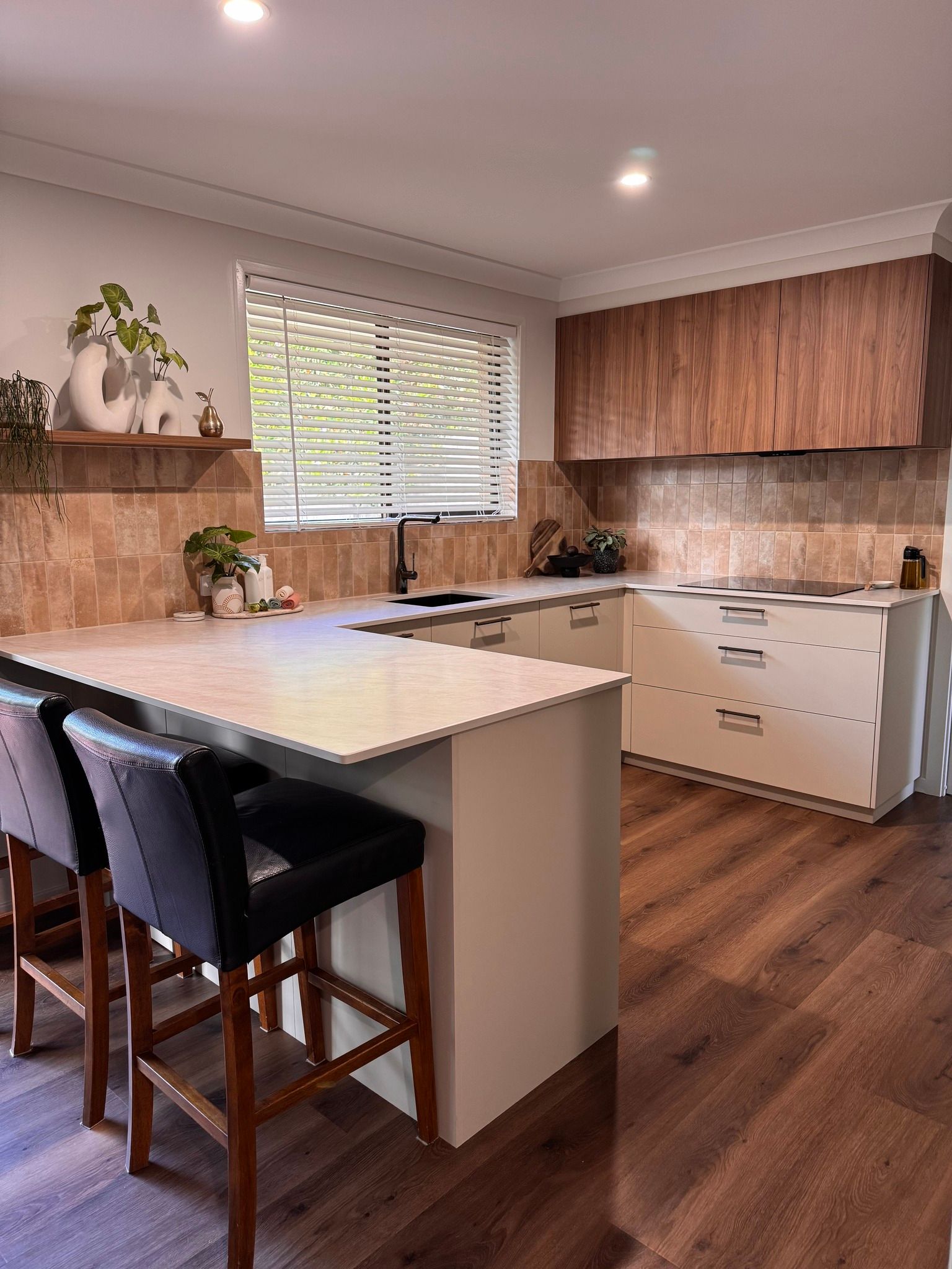 A Kitchen With Wooden Cabinets and a White Refrigerator — Concept Kitchens In Port Macquarie, NSW