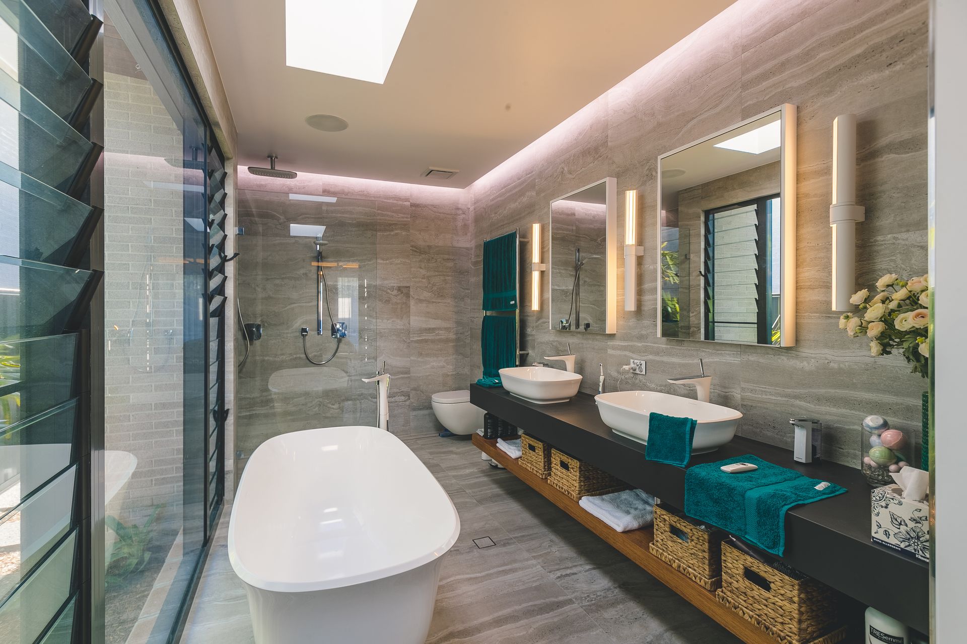 A Bathroom With Two Sinks , Two Mirrors , and a Walk in Closet — Concept Kitchens In Port Macquarie, NSW