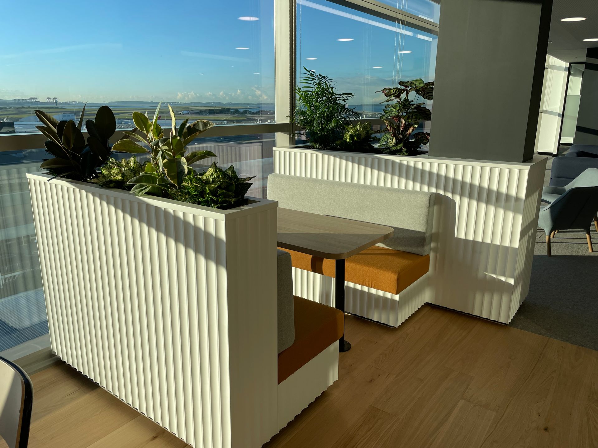 A Large Empty Office With a Lot of Desks and Chairs — Concept Kitchens In Laurieton, NSW