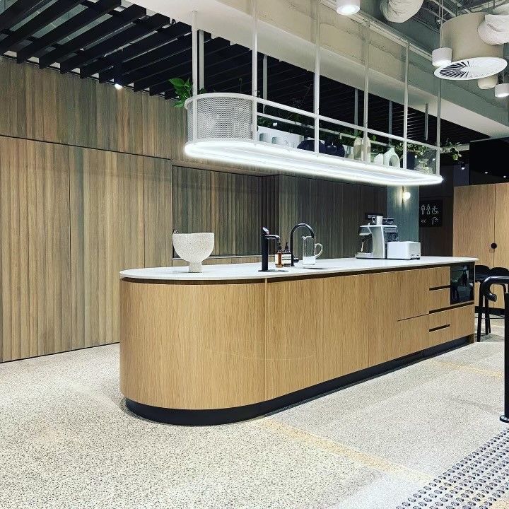 A Large Empty Office With Lots of Desks and Chairs — Concept Kitchens In Port Macquarie, NSW