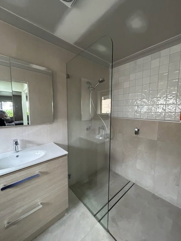 Modern Bathroom with Glass Shower Partition, Sink Vanity, Mirror — Mid Coast Tile Co in Wingham, NSW