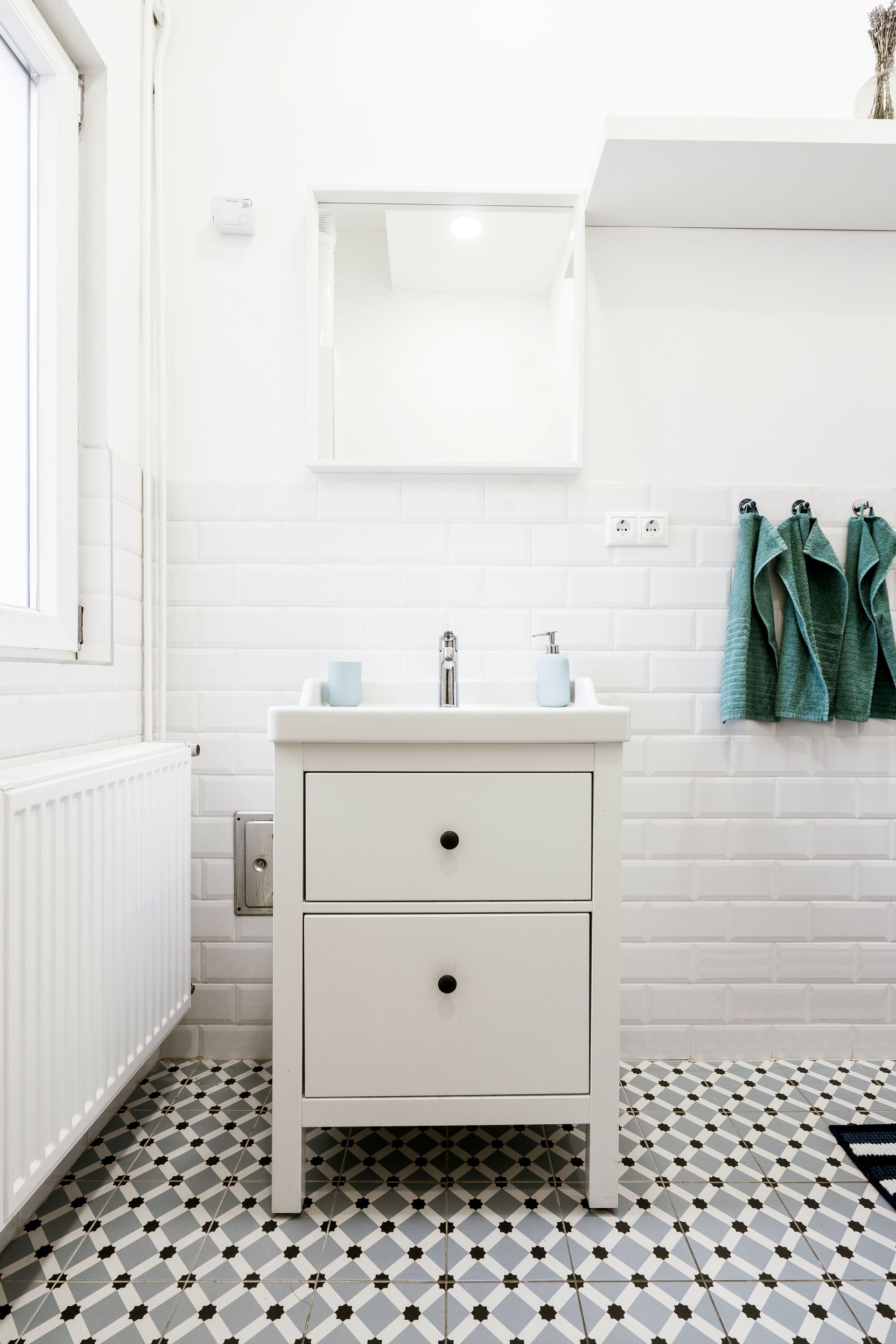 Three White Boards with Different Types of Hardware on Them — Mid Coast Tile Co in Taree, NSW