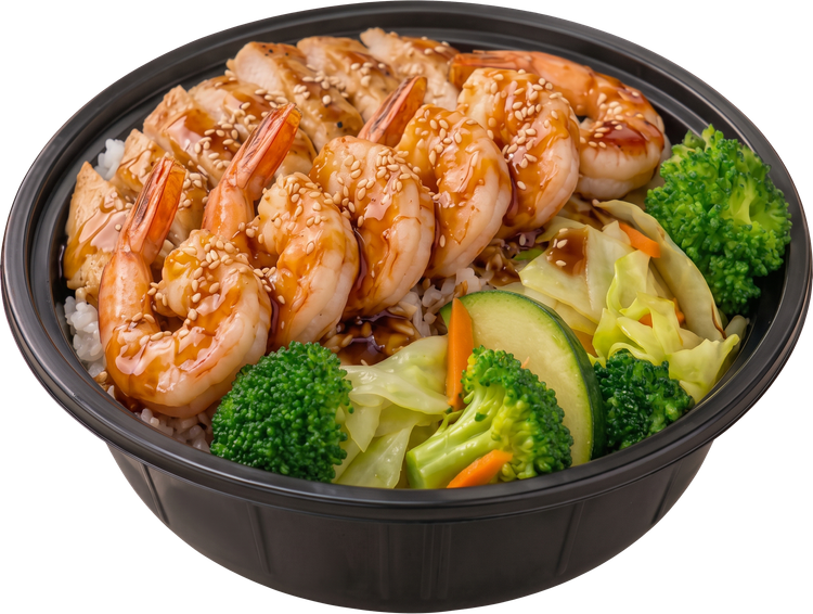Shrimp bowl with rice, broccoli, zucchini, and cabbage in a black takeout container