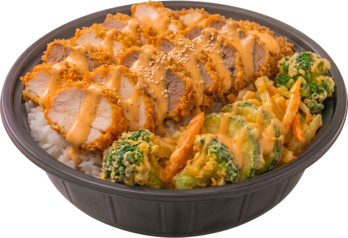 Bowl of rice topped with sliced chicken and curry sauce, with green vegetable tempura on the side