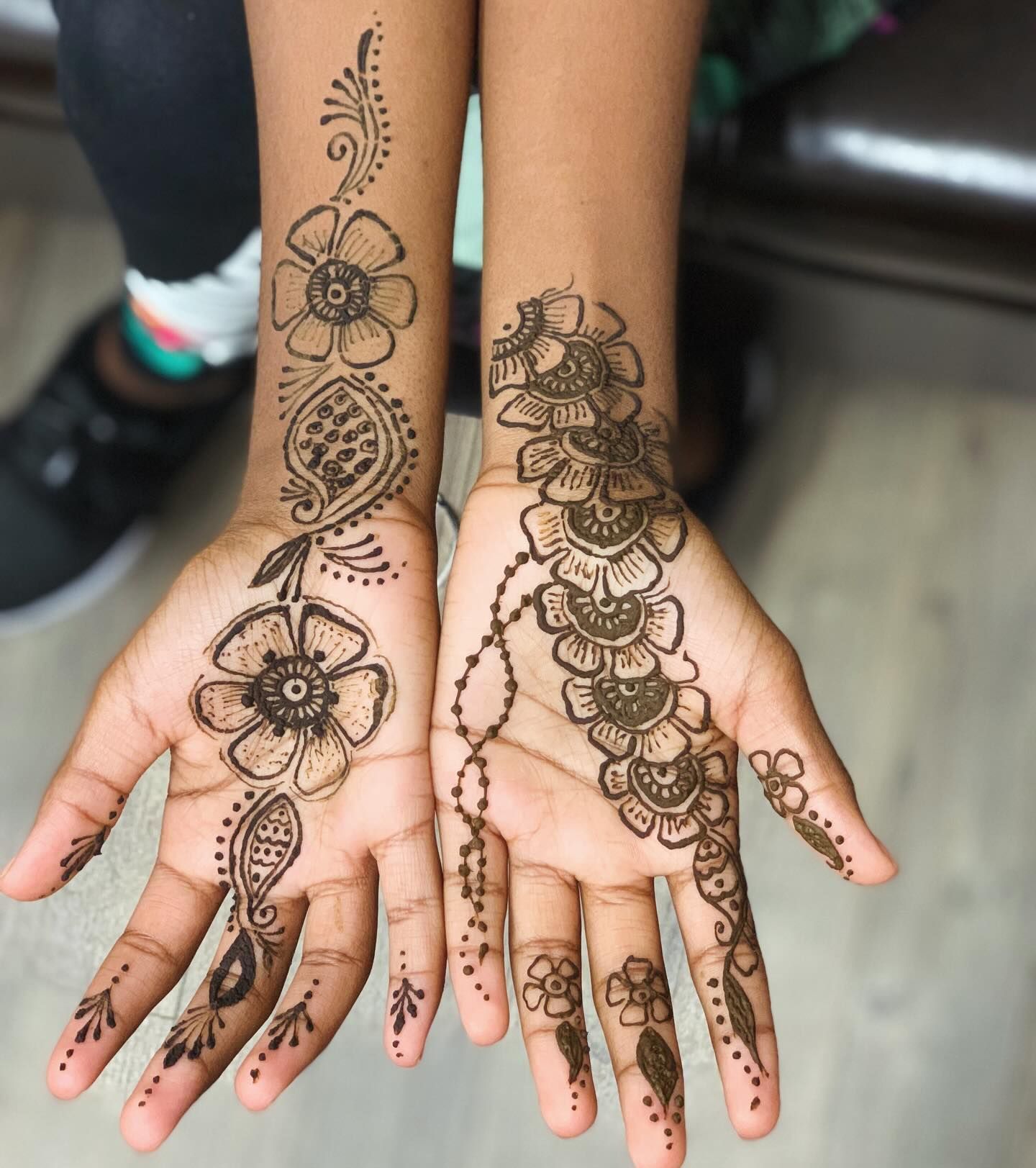 Two Hands with Henna Tattoo
