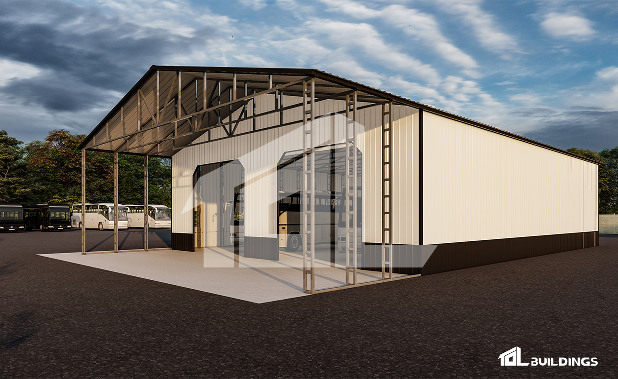Modern warehouse with a steel frame, cream walls, and large glass entrance under a cloudy sky