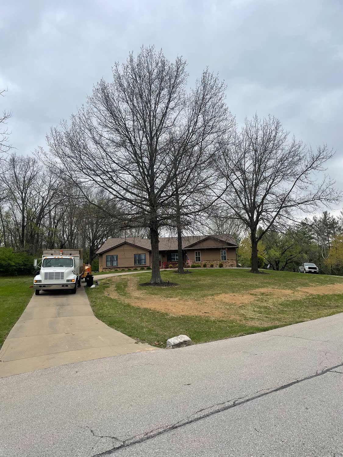 Tree Service Truck on Driveway — Warrenton, MO — L & R Tree Removal and Landscaping LLC