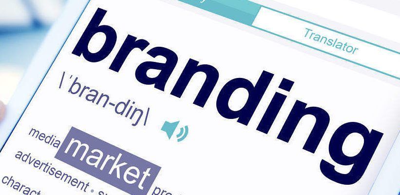 Designer researching the dos and don’ts of successful rebranding when choosing new colors for the company logo.