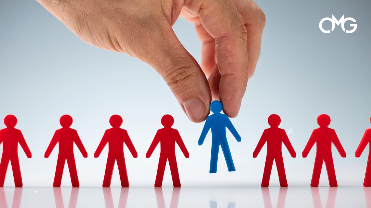 Abstract image of hand picking a person, symbolizing how to define your ideal customer