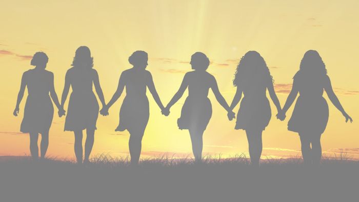 CCBC Sisterhood women silhouettes holding hands