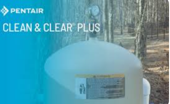 Pentair Clean & Clear Plus pool filter in a natural outdoor setting. Blue and white text overlay.