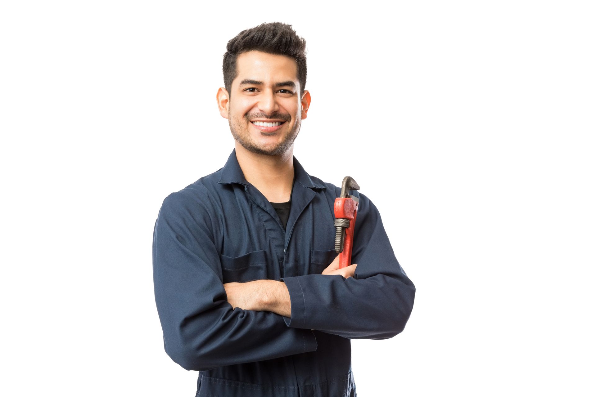 A Pro Temp technician is standing in front of a water heater holding a wrench.