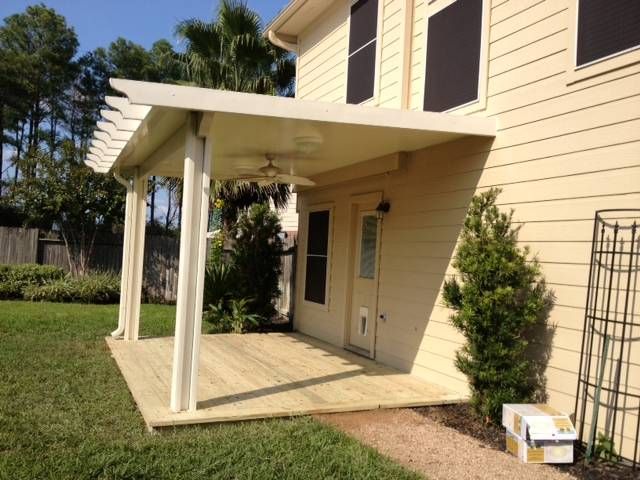 Modern patio cover with aluminum framing and LED strip lighting in Luling, TX